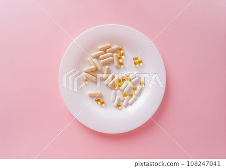 Weight Loss Pills and Measuring Tape, Diet Supplements Capsules, Obesity Lose Tablets, Color Drugs Pile Weight Loss Pills and Measuring Tape, Diet Supplements Capsules, Obesity Lose Tablets, Color Drugs Pile 108247041