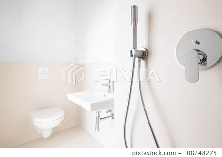 modern new bathroom, shower, sink and toilette 108248275
