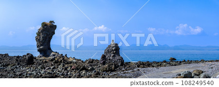 Futagoiwa, a lava tower and rocky landscape with the ocean in the background, a tourist spot in Minamishimabara City, Nagasaki Prefecture Futagoiwa, a lava tower and rocky landscape with the ocean in the background, a tourist spot in Minamishimabara City, Nagasaki Prefecture 108249540