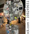 Behind the sign with the sticker 108249651
