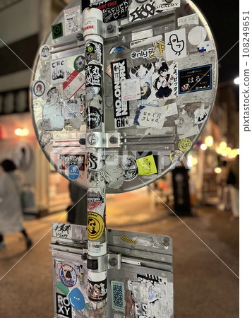 Behind the sign with the sticker 108249651