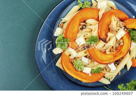 Pasta with pumpkin, autumn meal. Pasta with pumpkin, autumn meal. 108249807