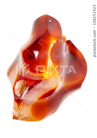 Macro mineral stone Cornelian on a white background Macro mineral stone Cornelian on a white background 108251425