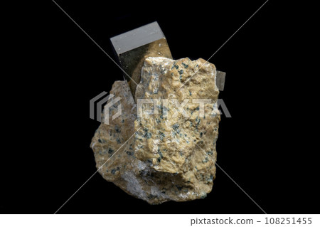 Macro Pyrite mineral stone on black background 108251455