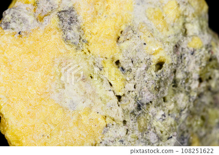 Macro mineral stone Sulfur on black background 108251622