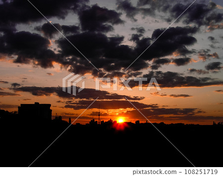 Autumn red sunset with a purple sky 108251719