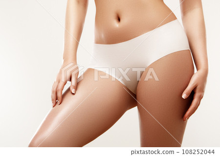 Beautiful slim woman's body. Perfect slim toned 108252044