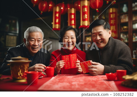 Multi generation family celebrating Chinese New Year Multi generation family celebrating Chinese New Year 108252382