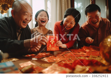 Multi generation family celebrating Chinese New Year Multi generation family celebrating Chinese New Year 108252411