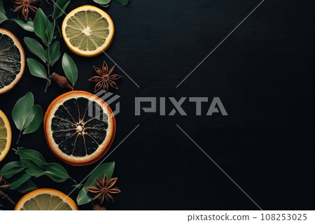 Christmas composition. Wreath made of spices and dry oranges Flat lay, top view, copy space 108253025