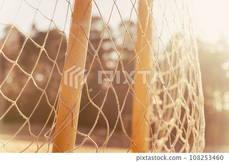 soccer goal on a sandy beach near the sea soccer goal on a sandy beach near the sea 108253460