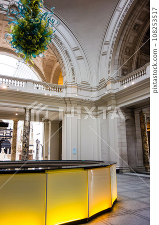 Interior of a historic building with white walls and an arch design at the Victoria and Albert Museum in London 108253517