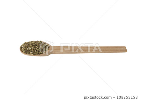 Dry Tansy Herb in latin Tanacetum vulgare on wooden spoon isolated on white background.  Herbs. Alternative medicine. 108255158