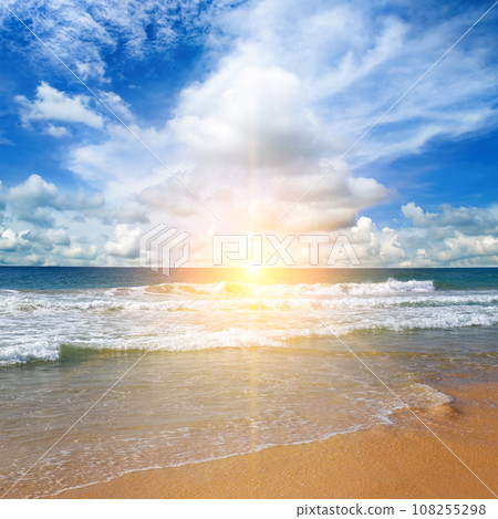 Tropical beach, blue sea and bright sun rise. Tropical beach, blue sea and bright sun rise. 108255298