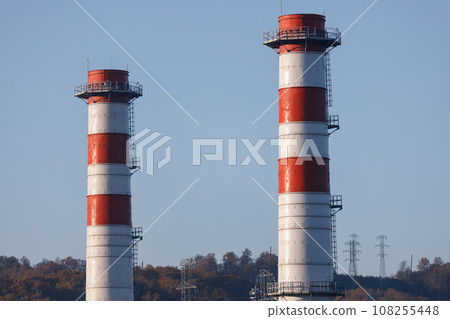 Power plant with two red and white pipes Power plant with two red and white pipes 108255448