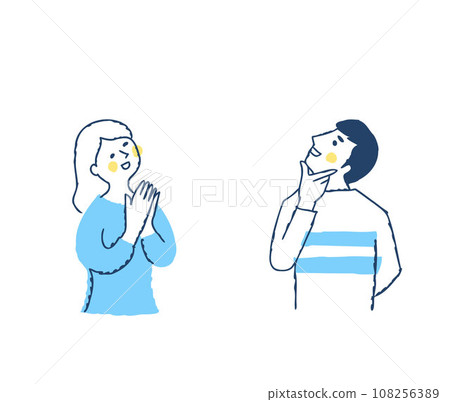 A young couple rejoicing while looking upwards 108256389