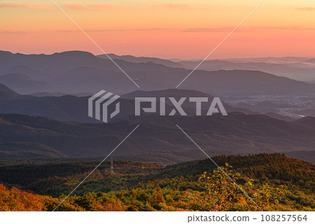Spectacular views of the mountains bathed in the morning glow from the Bandai Azuma Skyline 108257564