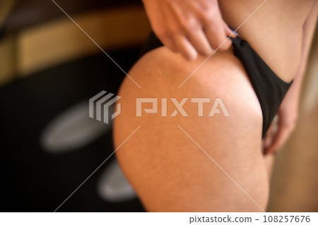 Tan Results, Tan Session, Bronzing Process. In no time, woman receives bronzed look using state-of-the-art tanning equipment. Tan Results, Tan Session, Bronzing Process. In no time, woman receives bronzed look using state-of-the-art tanning equipment. 108257676