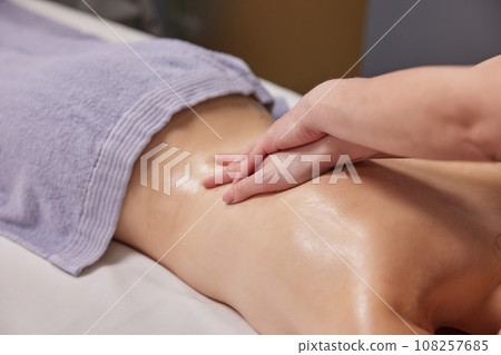 Relaxing Experience, Body Relaxation, Relaxing Oils. Aromatic oils are enhancing woman's massage experience at this prestigious beauty spa. Relaxing Experience, Body Relaxation, Relaxing Oils. Aromatic oils are enhancing woman's massage experience at this prestigious beauty spa. 108257685