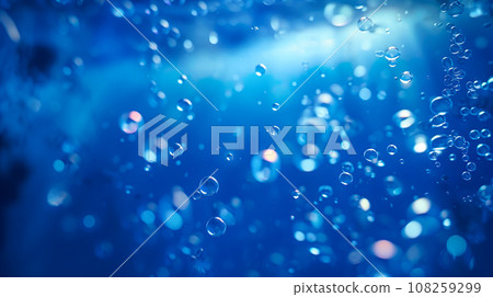 光線照進水中的背景和美麗的氣泡“AI生成圖像” 光線照進水中的背景和美麗的氣泡“AI生成圖像” 108259299