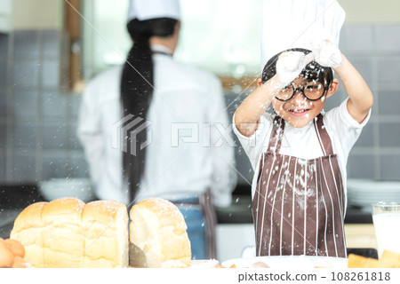 Lifestyle Family. Chef asian mother and kid boy cooking toast Lifestyle Family. Chef asian mother and kid boy cooking toast 108261818
