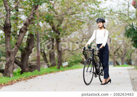 Young woman in business casual clothes walking Stock Photo