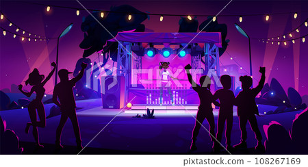 People crowd in night park on music festival stage 108267169