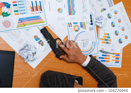 Stressed Asian Businessman sleep with holding Gun and many information graph 108270048