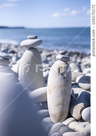 Scenery with stones Nariishi Beach (Kotoura Town) 108270272