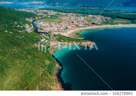 Aerial view of coastline with beach and ocean in Brazil. Barra da lagoa in Florianopolis Aerial view of coastline with beach and ocean in Brazil. Barra da lagoa in Florianopolis 108270865
