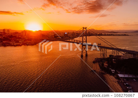 Cable bridge with sunset in Florianopolis, Brazil. Aerial view Cable bridge with sunset in Florianopolis, Brazil. Aerial view 108270867
