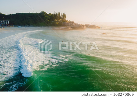 Coastline with rocks and ocean with waves and sunrise in Brazil. Aerial view Coastline with rocks and ocean with waves and sunrise in Brazil. Aerial view 108270869