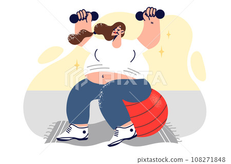 Pregnant woman is doing fitness sitting on large yoga ball and lifting dumbbells above head 108271848