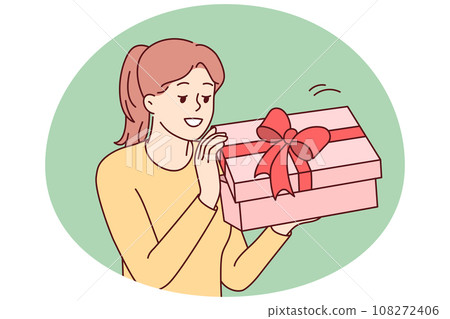 Excited woman open birthday present Excited woman open birthday present 108272406