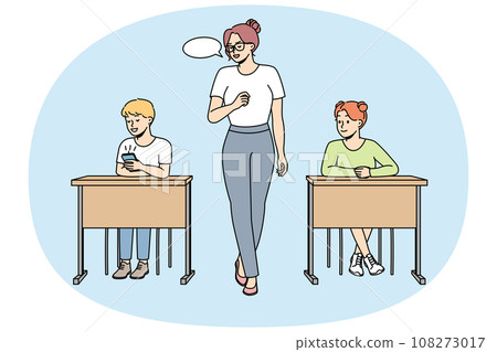 Teacher makes remark to schoolboy looking at cell phone. Teacher makes remark to schoolboy looking at cell phone. 108273017