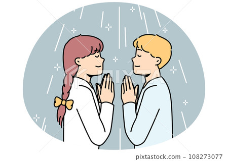 Boy, girl pray to God facing each other in church. Boy, girl pray to God facing each other in church. 108273077