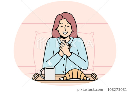 Girl is going to eat croissant, coffee in bed in morning. Girl is going to eat croissant, coffee in bed in morning. 108273081