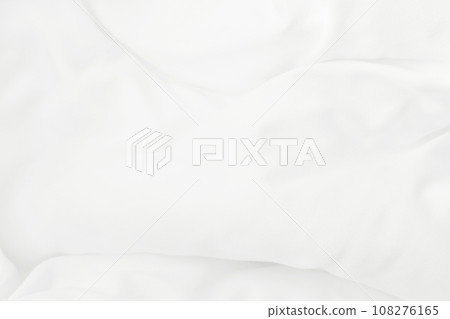 Close up top view of white bedding sheet and wrinkle messy blanket in bedroom after wake up in the morning. 108276165