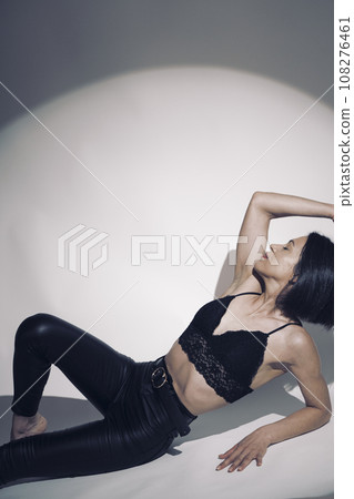 Sexy female underwear model in studio Sexy female underwear model in studio 108276461