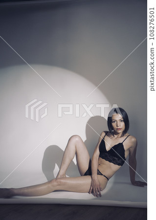 Beautiful lady underwear model in studio 108276501