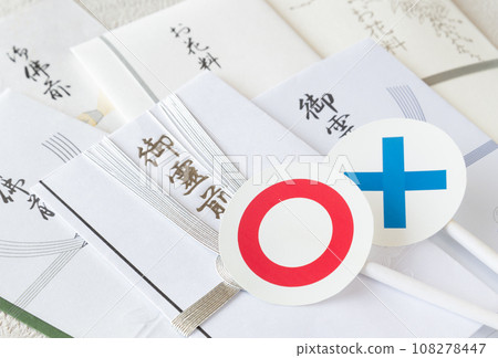 Various gift bags and ○× flowers, etiquette in front of the shrine, in front of the Buddha Various gift bags and ○× flowers, etiquette in front of the shrine, in front of the Buddha 108278447