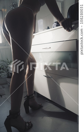 Sexy girl long legs in bathroom Sexy girl long legs in bathroom 108280031