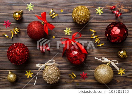 Christmas ball on colored background. decoration bauble with ribbon bow with copy space Christmas ball on colored background. decoration bauble with ribbon bow with copy space 108281133