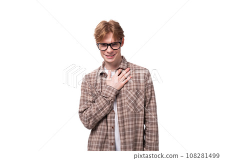 young caucasian man with red hair wears glasses and a shirt 108281499