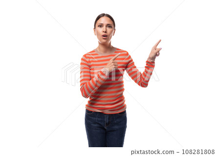 young slender adult woman with a ponytail dressed in an orange striped blouse and jeans with young slender adult woman with a ponytail dressed in an orange striped blouse and jeans with 108281808