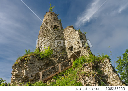 Ruins of medieval castle Starhrad , Slovakia, Mala Fatra, spring day, blue sky with clouds. 108282333