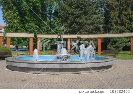 Park in city Zilina, water fountain zilina virgins in spring day, Slovakia. 108282403