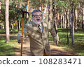 Funny old man with a stick. 108283471