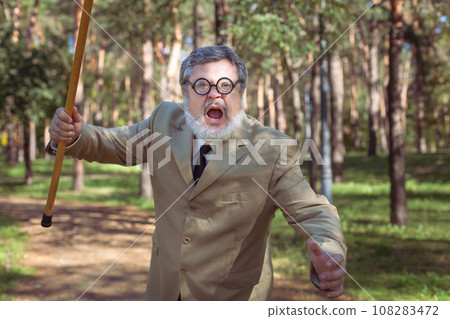 Funny old man with a stick. Funny old man with a stick. 108283472