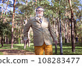 Funny old man with a stick. 108283477